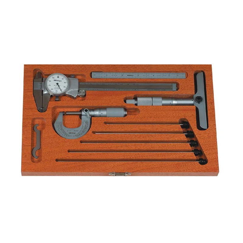 Mitutoyo precision measurement tool set in a wooden case, including a dial caliper, outside micrometer, depth micrometer, and steel rule.