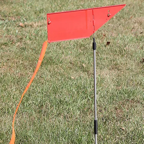 Flags showing wind direction, essential for long-range shooting.