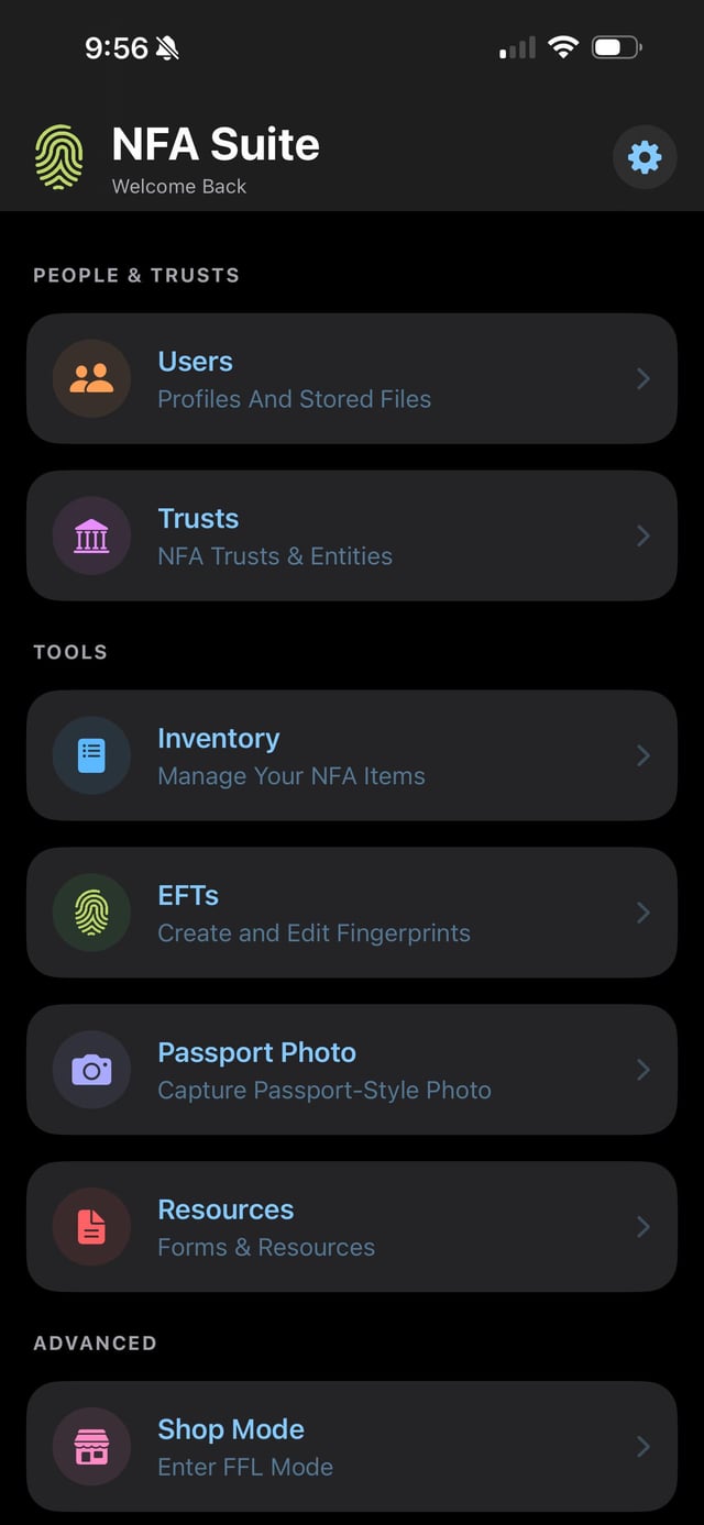 Screenshot of the NFA Suite mobile app home screen showing menu options for Users, Trusts, Inventory, EFTs, Passport Photo, Resources, and Shop Mode on a dark background.