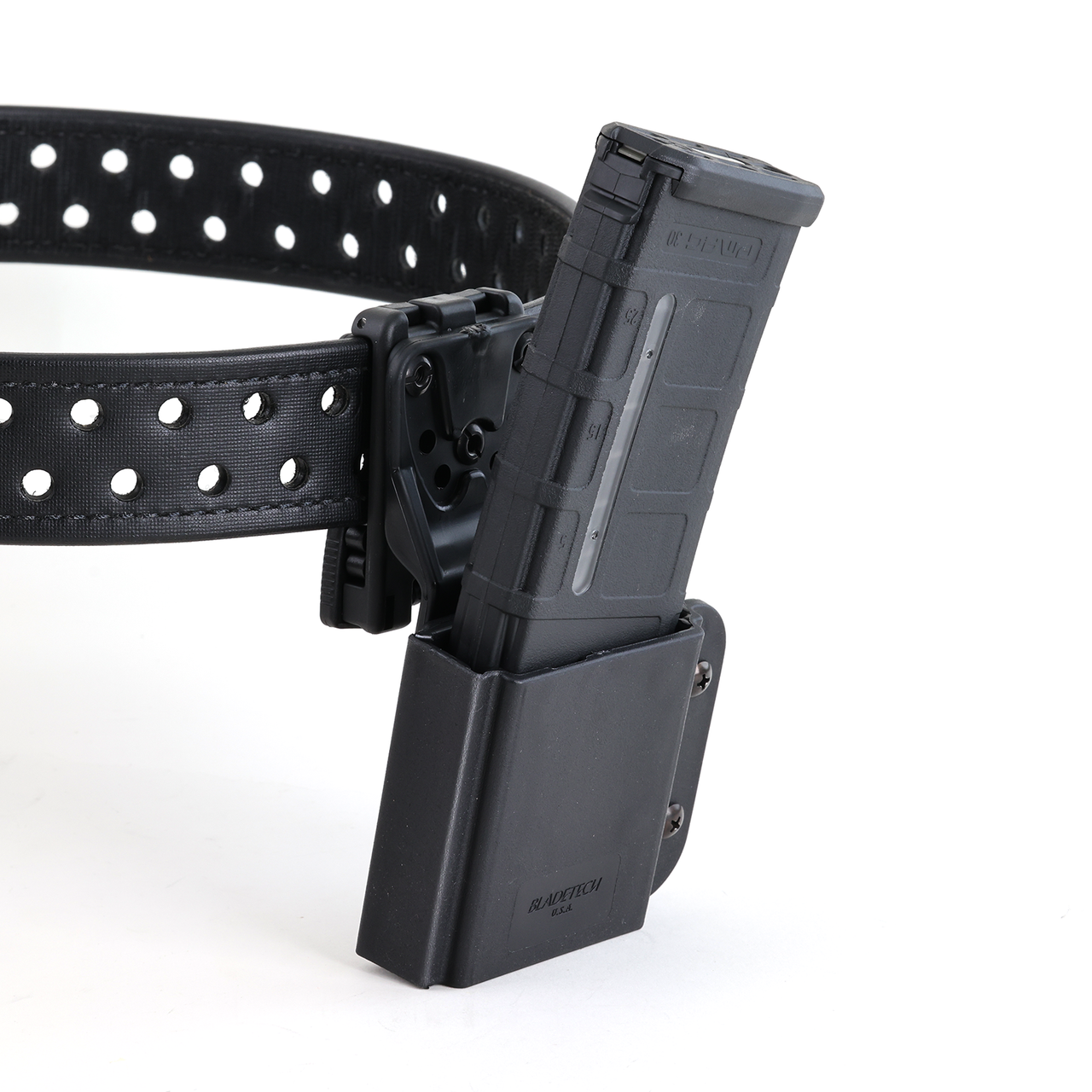 Blade-Tech magazine pouch with Magpul PMAG 30-round magazine mounted on a perforated tactical belt