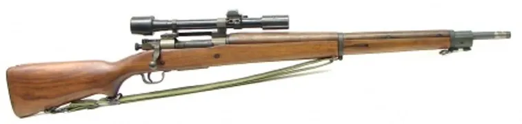 Detailed view of the receiver markings on a Springfield M1903 rifle.