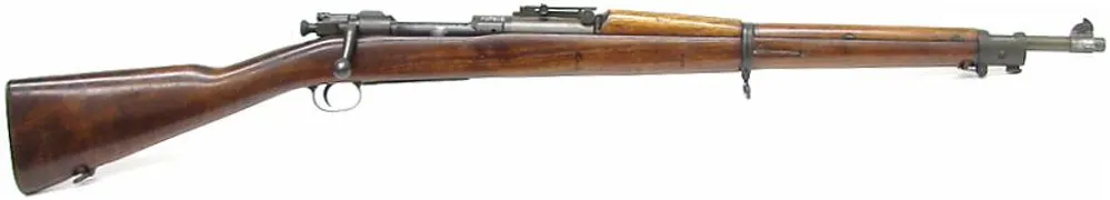 The stock of a Springfield M1903 rifle featuring military cartouches.