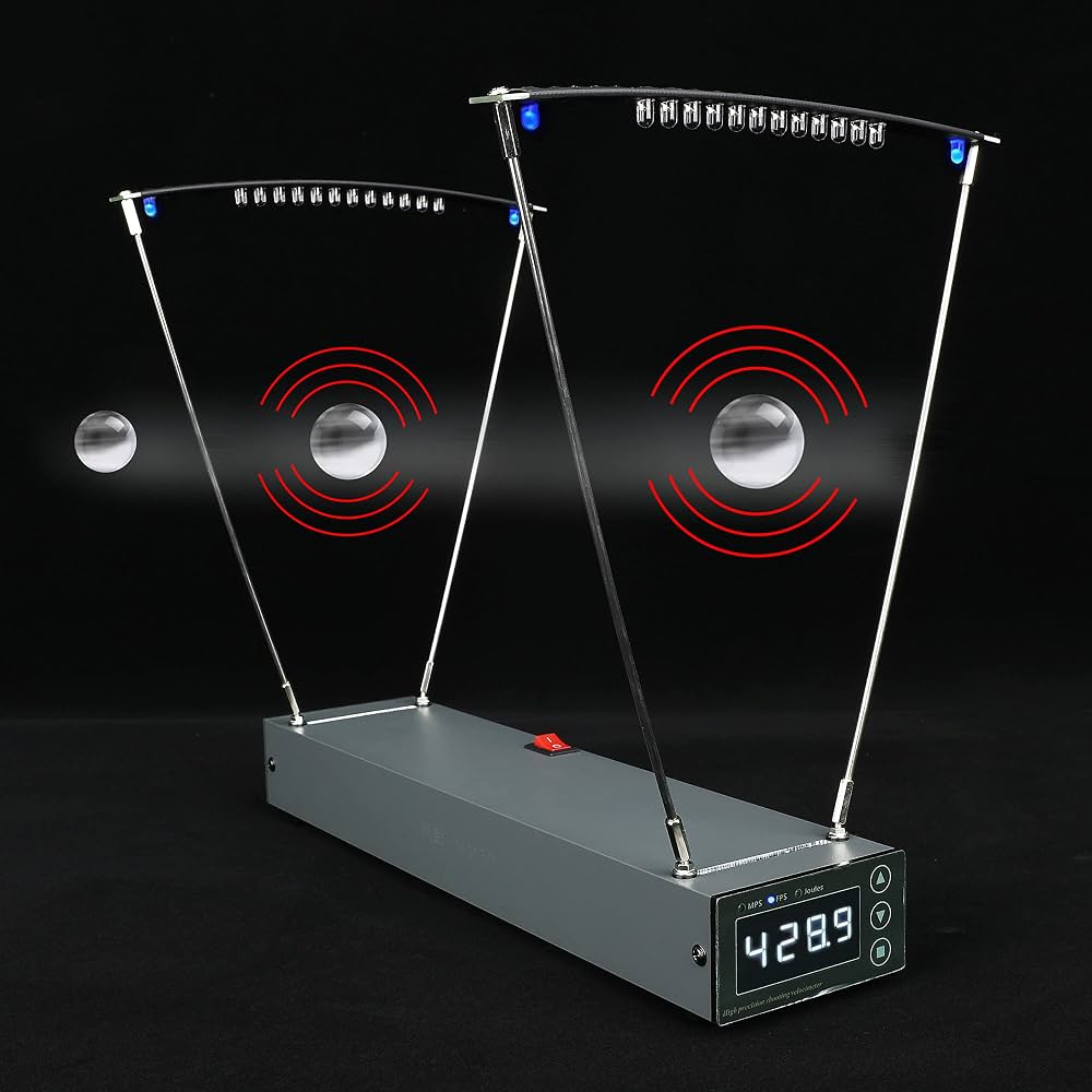 Ballistic chronograph with two sensor screens and a digital display reading 428.9 fps, set against a black background.