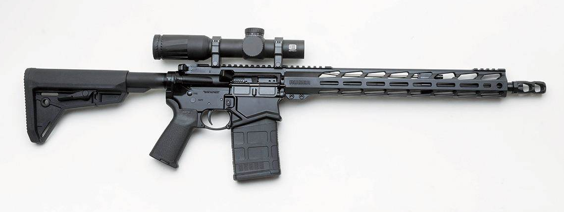 Black AR-platform .308 semi-automatic rifle with magnified scope, M-LOK handguard, and Magpul stock and magazine