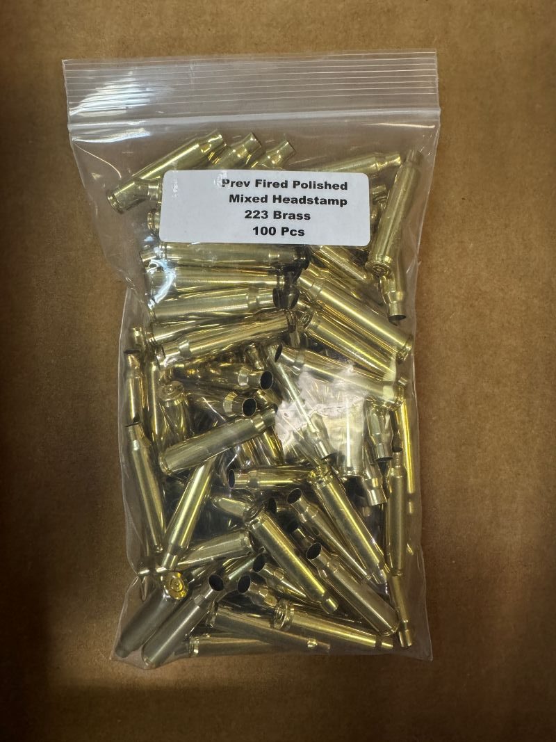 Clear zip-lock bag containing 100 pieces of polished once-fired .223 Remington brass cases with mixed headstamps, labeled accordingly.