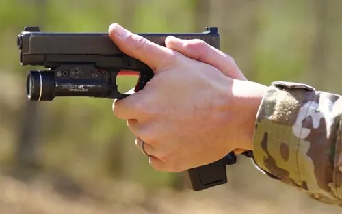 Essential tools for installing a drop-in trigger in a Glock pistol.