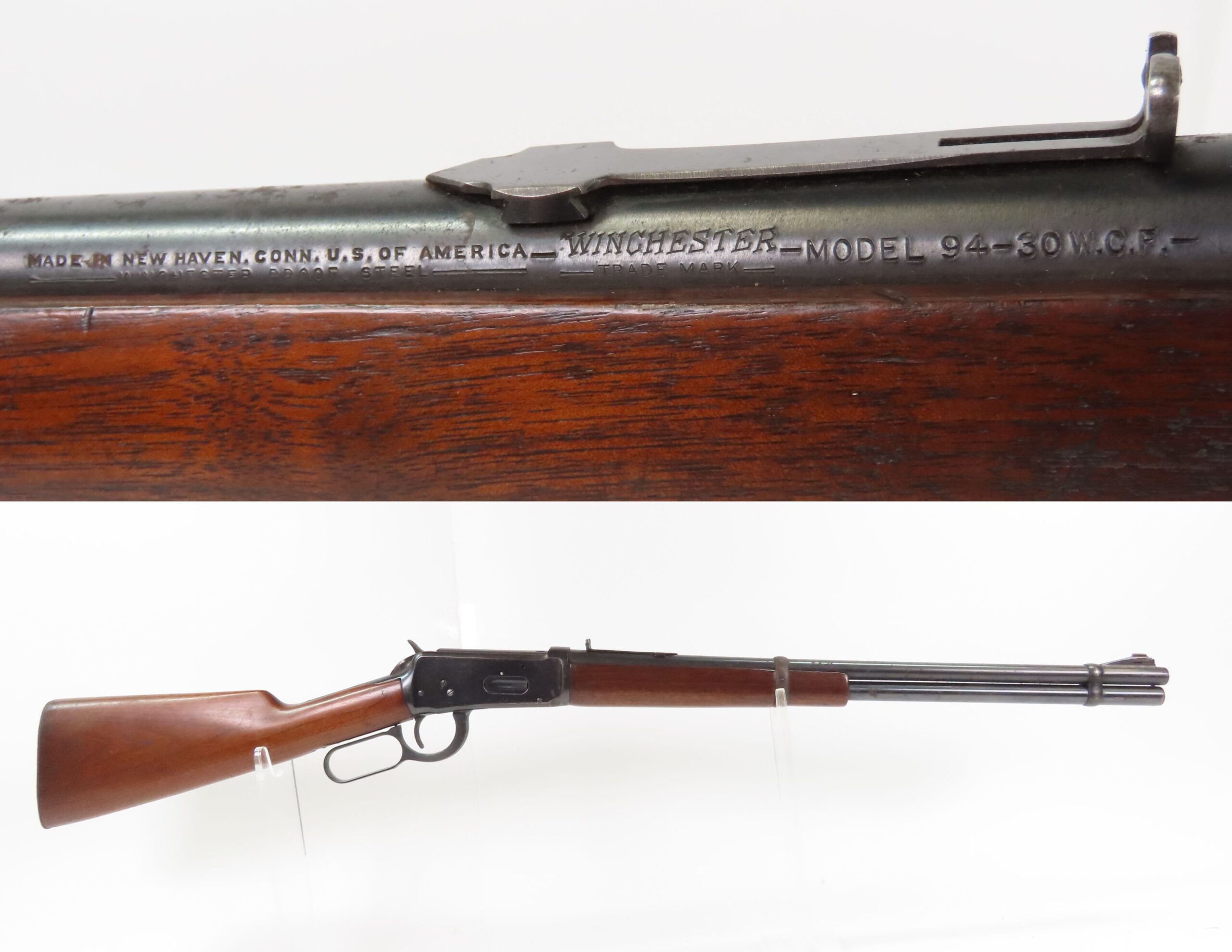 Winchester Model 94 lever-action rifle in .30 WCF, showing barrel roll marks reading 'Made in New Haven Conn. U.S. of America, Winchester, Model 94, 30 W.C.F.' with walnut stock and blued finish.