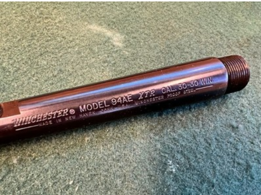 collectible Winchester and Marlin lever-action rifles