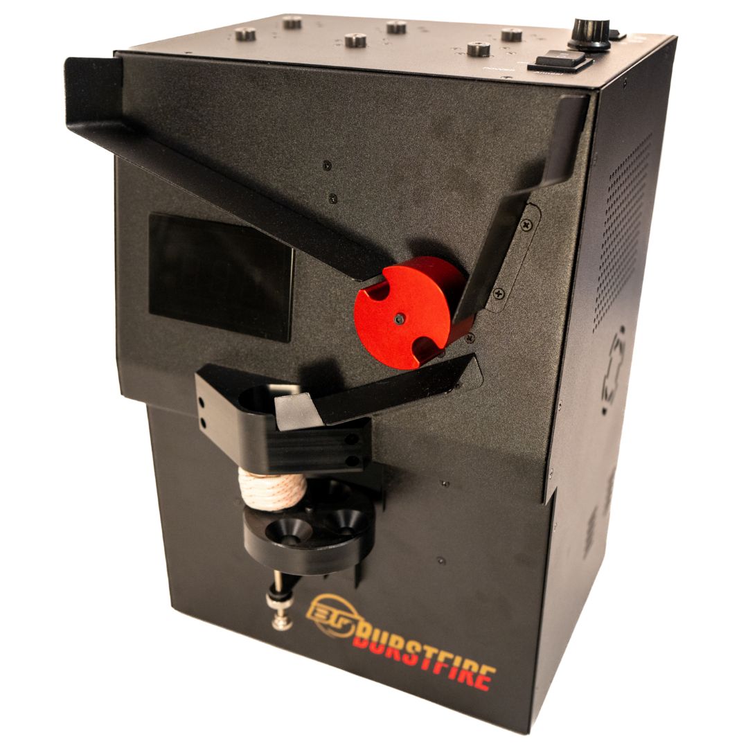 BTF Burstfire automated brass processing machine, a black metal enclosure with red rotary indexer, case feed mechanism, and control panel on top.