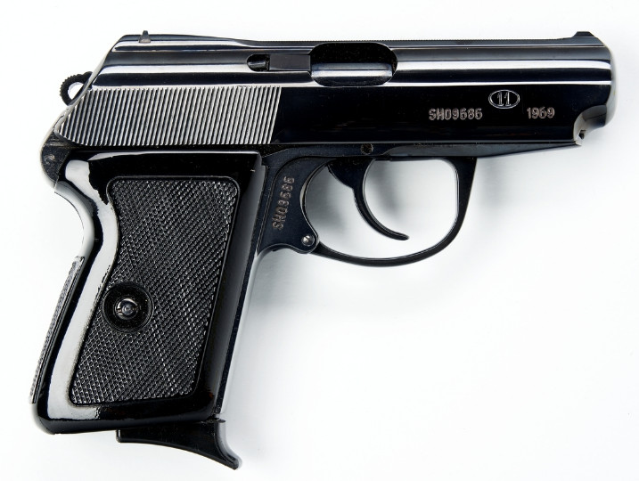 Polish P-64 pistol, 1969 manufacture, blued finish with black checkered grips, right side view