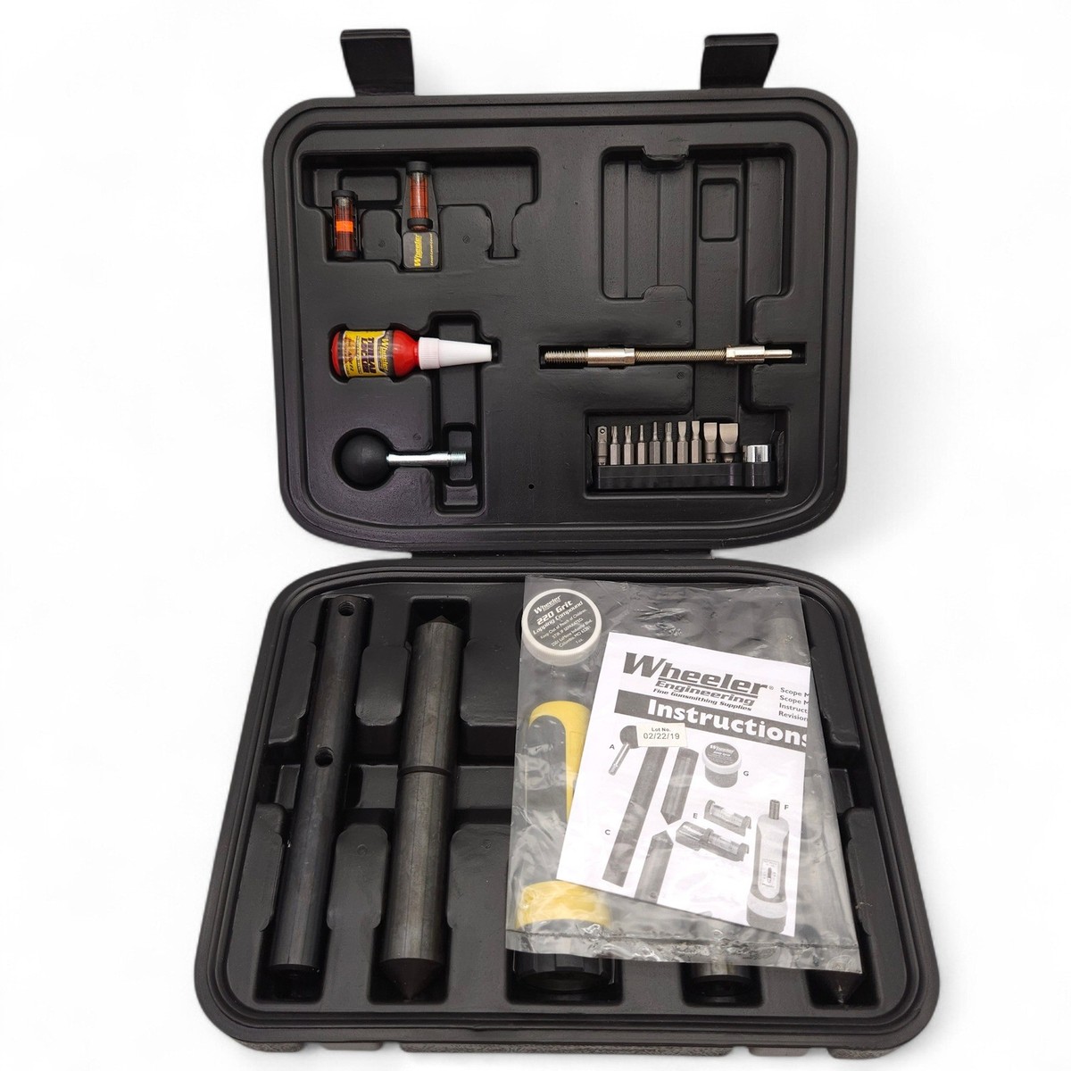 Wheeler Engineering scope mounting and lapping kit open in hard case with lapping bars, compound, bits, and instructions