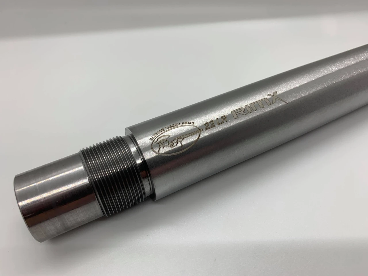 Stainless steel .22 LR RIMX barrel from Patriot Valley Arms with threaded muzzle end, engraved with manufacturer logo and caliber markings.